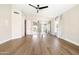 Open main bedroom featuring hardwood floors, recessed lighting, and a large mirrored wall closet at 6174 E Janice Way, Scottsdale, AZ 85254
