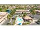 Beautiful aerial view of the community showcasing the pool area, landscaping, and building exteriors at 6535 E Superstition Springs Blvd # 146, Mesa, AZ 85206