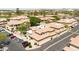 Overview of the condo complex, showcasing well-maintained buildings with ample parking at 6535 E Superstition Springs Blvd # 146, Mesa, AZ 85206