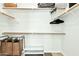 Walk-in closet with multiple shelves, rods, and space for storage solutions at 6535 E Superstition Springs Blvd # 146, Mesa, AZ 85206