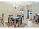 Comfortable dining area with a large table and decor, adjacent to a bright window at 6535 E Superstition Springs Blvd # 146, Mesa, AZ 85206