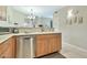 Kitchen area showcases stainless steel dishwasher and sink with light countertops at 6535 E Superstition Springs Blvd # 146, Mesa, AZ 85206