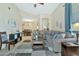 Open living room offers lots of space, neutral colors, and view to the dining area at 6535 E Superstition Springs Blvd # 146, Mesa, AZ 85206
