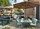 Outdoor patio with a barbecue, and plenty of seating perfect for entertaining at 6535 E Superstition Springs Blvd # 146, Mesa, AZ 85206