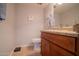 Bathroom featuring a vanity with wooden cabinets and light countertops at 7126 N 19Th Ave # 122, Phoenix, AZ 85021