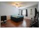 Bedroom with hardwood floors, ceiling fan and neutral walls at 7126 N 19Th Ave # 122, Phoenix, AZ 85021