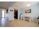 A bright dining area with tile floors and a view into the kitchen at 7126 N 19Th Ave # 122, Phoenix, AZ 85021