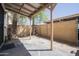 Spacious covered patio with concrete flooring and chain link fence at 7126 N 19Th Ave # 122, Phoenix, AZ 85021