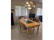 Eat in kitchen with natural light and a dining table with four chairs at 7609 E Indian Bend Rd # 1012, Scottsdale, AZ 85250