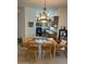 Eat in kitchen with views of the kitchen, dining table with seating for six, and tile flooring at 7609 E Indian Bend Rd # 1012, Scottsdale, AZ 85250