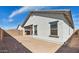 View of new home construction showing the side and backyard area with ample space and potential at 7657 W Minton St, Laveen, AZ 85339