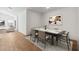 Dining room with modern table set and sleek decor, perfect for entertaining guests at 7657 W Minton St, Laveen, AZ 85339