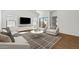 Cozy living room setup with modern furniture, a TV, and a stylish area rug at 7657 W Minton St, Laveen, AZ 85339