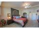 Comfortable bedroom with a ceiling fan and a serene ambiance at 80 S Laura Ln, Casa Grande, AZ 85194