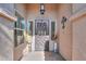 Inviting entryway with decorative front door, sidelight windows, and attractive interior design elements at 80 S Laura Ln, Casa Grande, AZ 85194