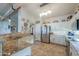 Beautiful kitchen featuring stainless steel appliances, ample cabinetry, and granite countertops at 80 S Laura Ln, Casa Grande, AZ 85194