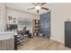 Functional room with a desk setup, great lighting, and ample shelving for organization at 914 E Pedro Rd, Phoenix, AZ 85042