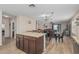 This kitchen with island flows into the dining and living areas at 914 E Pedro Rd, Phoenix, AZ 85042