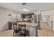 The kitchen features an island with bar seating at 914 E Pedro Rd, Phoenix, AZ 85042