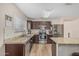 The kitchen has stainless appliances, granite counters, and plenty of cabinet space at 914 E Pedro Rd, Phoenix, AZ 85042