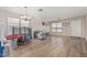 Spacious living area showcasing light wood floors and ample natural light at 914 E Pedro Rd, Phoenix, AZ 85042