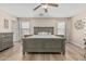 A spacious main bedroom with a ceiling fan and ample natural light at 914 E Pedro Rd, Phoenix, AZ 85042