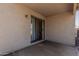 Covered outdoor patio with sliding glass doors offers a comfortable transition between indoor and outdoor living at 914 E Pedro Rd, Phoenix, AZ 85042