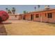 A backyard with ample space and blooming flowers for outdoor activities and enjoyment at 10603 W Ruth Ave, Peoria, AZ 85345