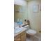 Bathroom featuring a toilet, vanity, large mirror, and decorative accents at 10603 W Ruth Ave, Peoria, AZ 85345