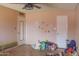 Bedroom with ceiling fan and lots of room for storage or to make it your own at 10603 W Ruth Ave, Peoria, AZ 85345