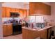 Kitchen featuring stainless steel appliances and laminate countertops at 10603 W Ruth Ave, Peoria, AZ 85345