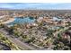 Expansive aerial view of lakeside community with multiple amenities and stunning scenery at 1101 N Peppertree Dr, Gilbert, AZ 85234