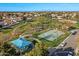 Community park with basketball court, playground, and shaded picnic areas, ideal for recreation at 1101 N Peppertree Dr, Gilbert, AZ 85234
