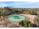 Picturesque lagoon with sandy beach area, inviting lounge chairs and the sound of a nearby waterfall at 1101 N Peppertree Dr, Gilbert, AZ 85234