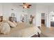 Spacious bedroom with wood floors and doorways to other rooms at 1101 N Peppertree Dr, Gilbert, AZ 85234