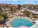Community aerial view includes a pool, outdoor seating, and scenic mountain backdrop at 11444 S 51St St, Phoenix, AZ 85044