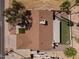 Aerial view of home with landscaped yard, screened in patio, and nearby street at 11444 S 51St St, Phoenix, AZ 85044