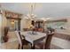 Spacious dining room open to the living area, filled with natural light and neutral decor at 11444 S 51St St, Phoenix, AZ 85044