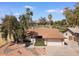 Attractive single-story home with a well-maintained lawn, desert landscaping, and attached two-car garage at 11444 S 51St St, Phoenix, AZ 85044