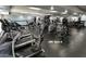 Well-equipped gym with treadmills, ellipticals, and weight machines for a complete fitness experience at 11444 S 51St St, Phoenix, AZ 85044