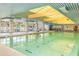 Bright indoor pool area with ample natural light, comfortable seating, and easy access to amenities for year-round enjoyment at 11444 S 51St St, Phoenix, AZ 85044