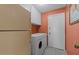 Laundry room features washer, dryer, and storage at 11444 S 51St St, Phoenix, AZ 85044