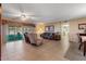 Cozy living room with tile floors, comfortable seating, and view of the backyard at 11444 S 51St St, Phoenix, AZ 85044