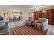 Spacious living area with comfortable recliners and an open dining space nearby at 11444 S 51St St, Phoenix, AZ 85044