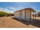 Exterior of the outbuilding featuring a covered porch and ample natural light at 15202 N 71St Dr, Peoria, AZ 85381