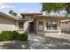 Inviting home entrance with desert landscaping and a well-maintained walkway at 15434 W Big Sky Dr, Surprise, AZ 85374