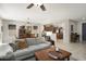 Spacious living area that opens to the dining and kitchen, perfect for entertaining at 15434 W Big Sky Dr, Surprise, AZ 85374