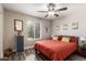 Inviting bedroom with decor, mirror, and natural light from the window at 1708 E Impala Ave, Mesa, AZ 85204