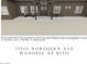Charming home with a covered porch and lots of curb appeal at 17205 W Northern Ave, Waddell, AZ 85355