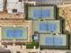 Bird's-eye view of the neighborhood tennis courts with well-maintained green spaces at 175 E Santa Lucia Ln, Queen Creek, AZ 85140